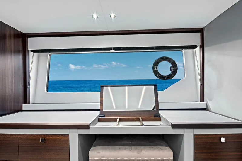 Slide: The Image of Luxurious interior of 2024 Sunseeker 76 Yacht with ocean view through large window. - 73