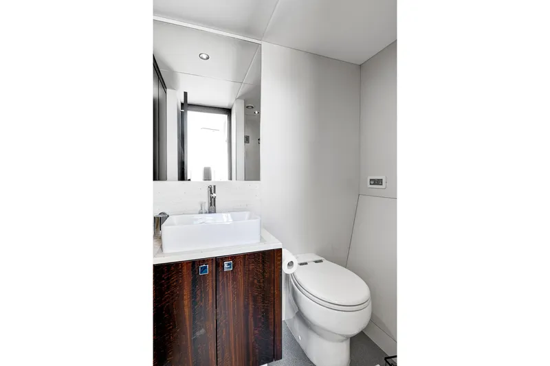 Slide: The Image of Luxurious bathroom in 2024 Sunseeker 76 Yacht with modern fixtures and elegant design. - 74