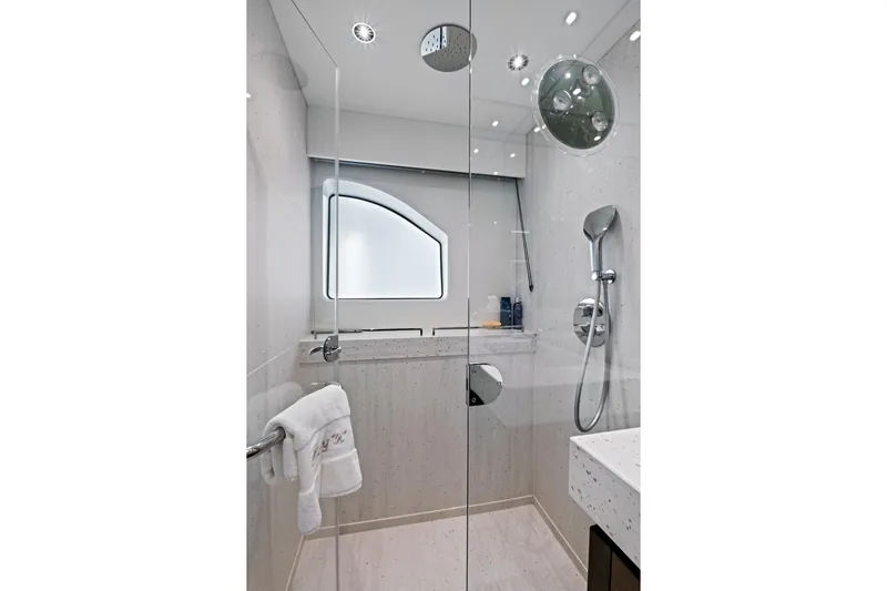 Slide: The Image of Luxurious bathroom in 2024 Sunseeker 76 Yacht with modern shower and elegant design. - 76
