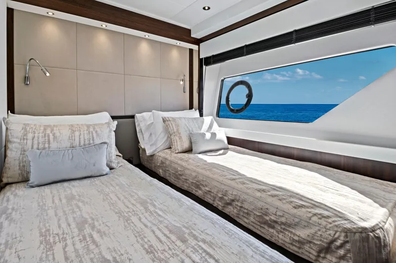 Slide: The Image of Luxurious twin bedroom on 2024 Sunseeker 76 Yacht with ocean view. - 79