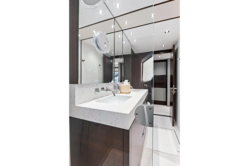 Slide: The Image of Luxurious bathroom in 2024 Sunseeker 76 Yacht with modern fixtures and elegant design. - 80