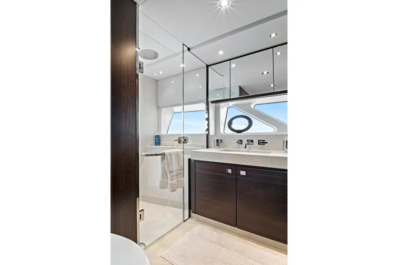 Slide: The Image of Luxurious bathroom interior of 2024 Sunseeker 76 Yacht with modern fixtures and ocean view. - 93