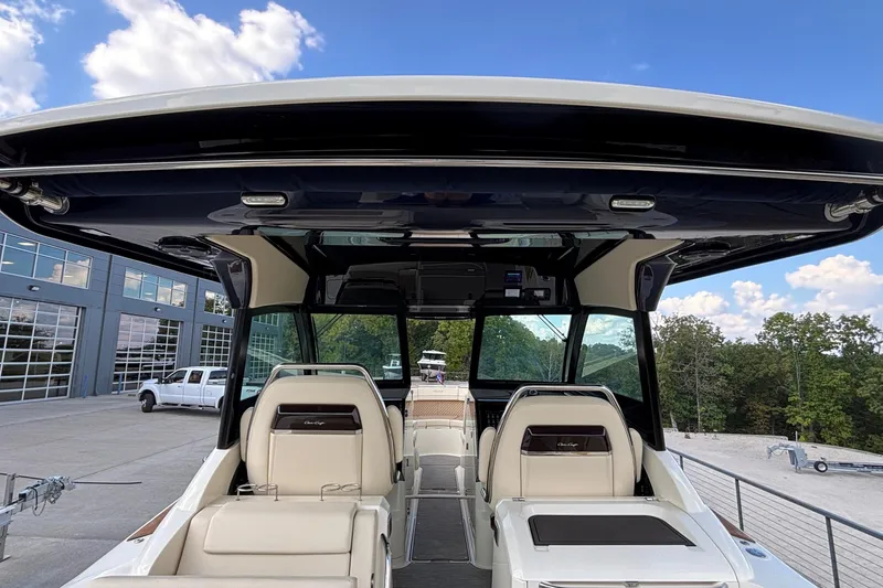 Slide: The Image of 2021 Chris-Craft Calypso 35 boat interior with luxurious seating and modern design. - 29