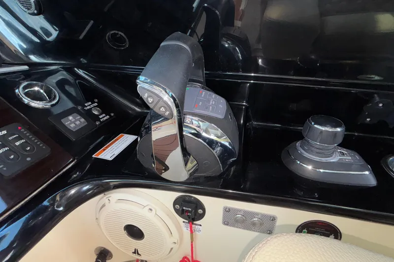 Slide: The Image of Control panel of 2021 Chris-Craft Calypso 35 boat with throttle and joystick. - 37