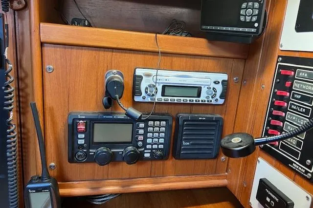 Slide: The Image of Control panel of a 1987 Tayana Vancouver 42 yacht with communication equipment. - 27