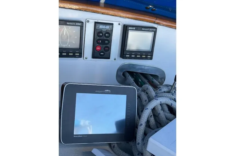 Slide: The Image of Control panel of a 1987 Tayana Vancouver 42 sailboat with navigation instruments. - 34