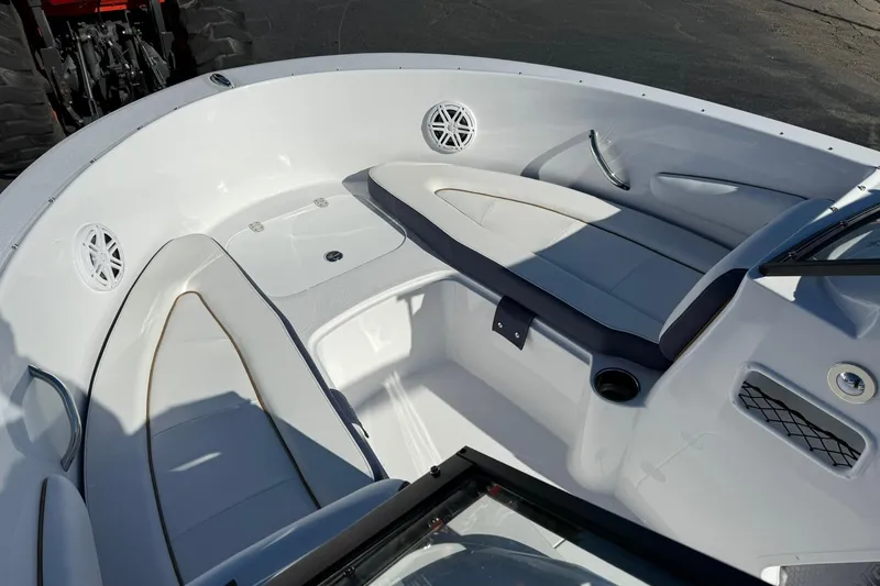 Slide: The Image of 2026 Stingray 172 DC boat interior with white seating and speakers. - 11