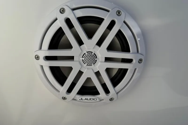 Slide: The Image of JL Audio speaker on 2026 Stingray 172 DC boat, white grille design. - 19