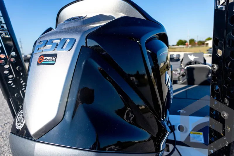 Slide: The Image of 2026 Skeeter ZXE21 boat engine, featuring a sleek black and silver design with "250" branding. - 23