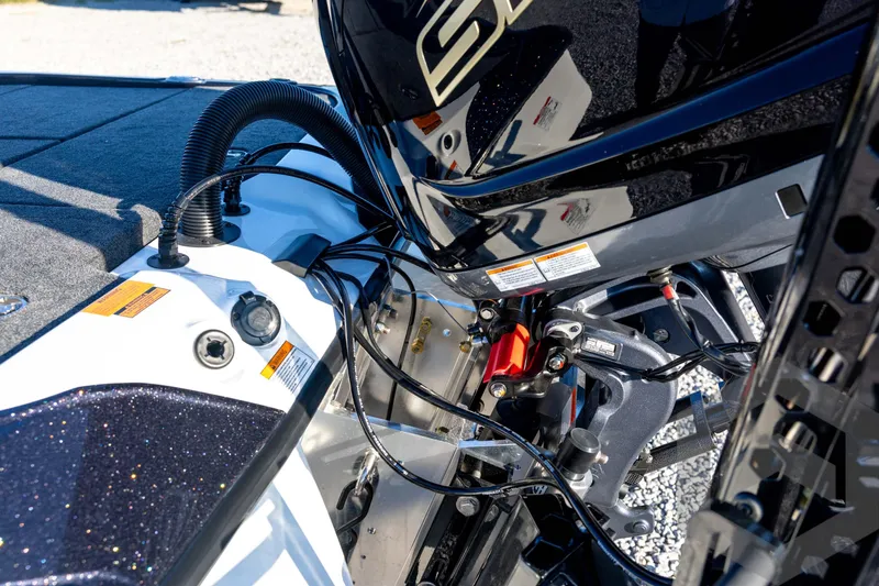 Slide: The Image of 2026 Skeeter ZXE21 boat engine and wiring details in close-up view. - 30