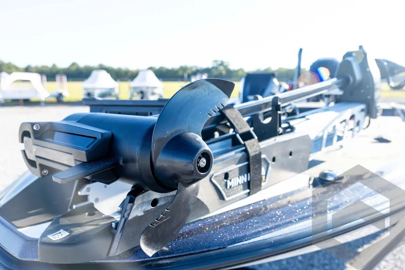 Slide: The Image of 2026 Skeeter ZXE21 boat with Minn Kota trolling motor, close-up view. - 36