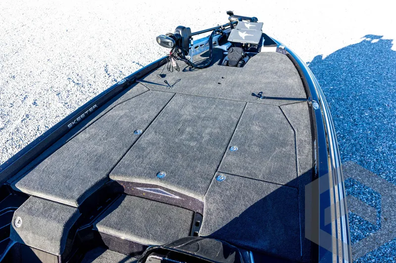 Slide: The Image of 2026 Skeeter ZXE21 boat deck with advanced fishing equipment and spacious layout. - 45