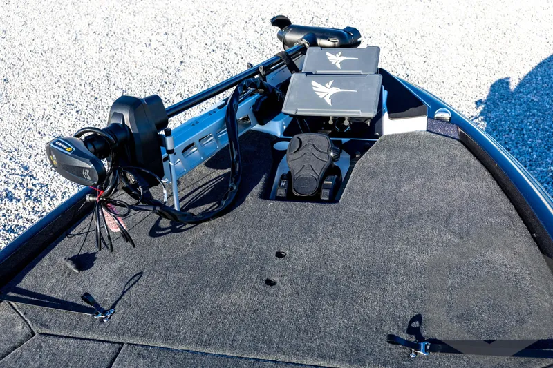 Slide: The Image of 2026 Skeeter ZXE21 boat deck with advanced trolling motor and control panels. - 46