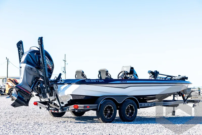 Slide: The Image of 2026 Skeeter ZXE21 boat on trailer, featuring sleek design and powerful engine. - 5