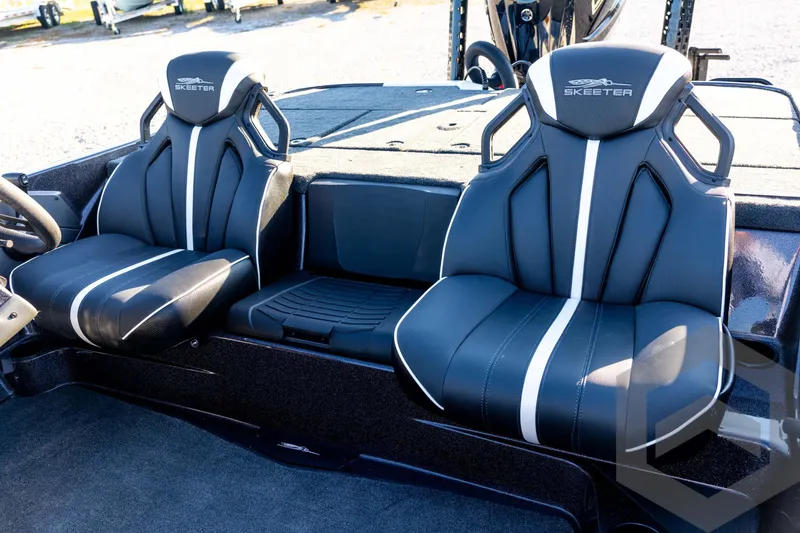 Slide: The Image of 2026 Skeeter ZXE21 boat interior with sleek black and white seating design. - 62