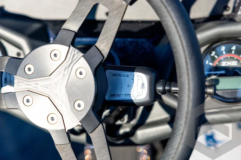 Slide: The Image of Steering wheel of 2026 Skeeter ZXE21 boat with jack plate control. - 69