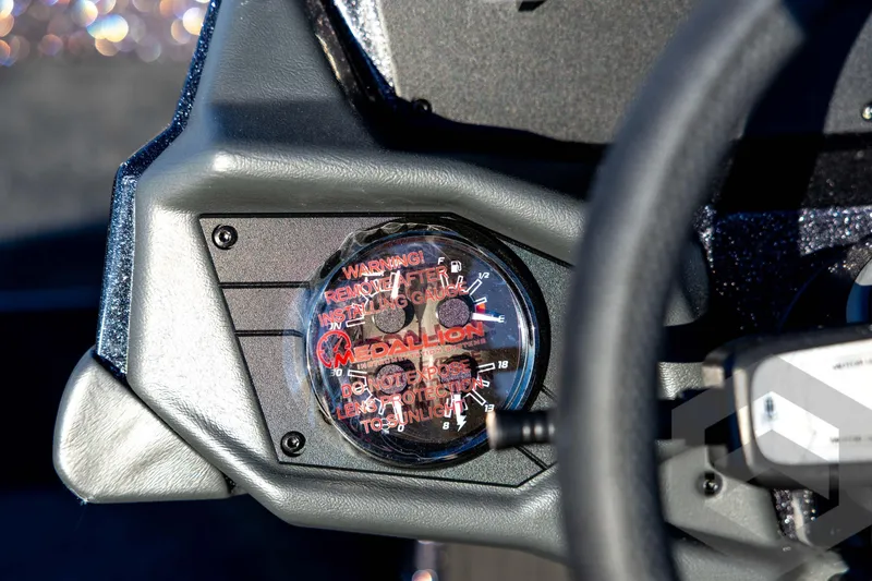 Slide: The Image of Gauge panel of 2026 Skeeter ZXE21 boat, featuring Medallion instrumentation. - 71