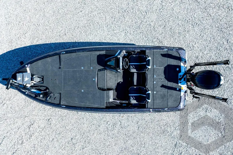 Slide: The Image of Top view of 2026 Skeeter ZXE21 fishing boat on gravel surface. - 84