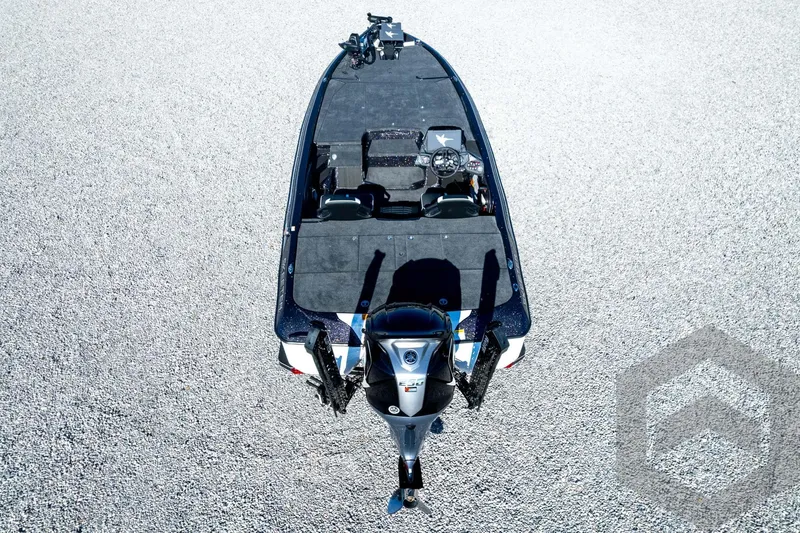 Slide: The Image of Aerial view of 2026 Skeeter ZXE21 boat on gravel surface. - 85