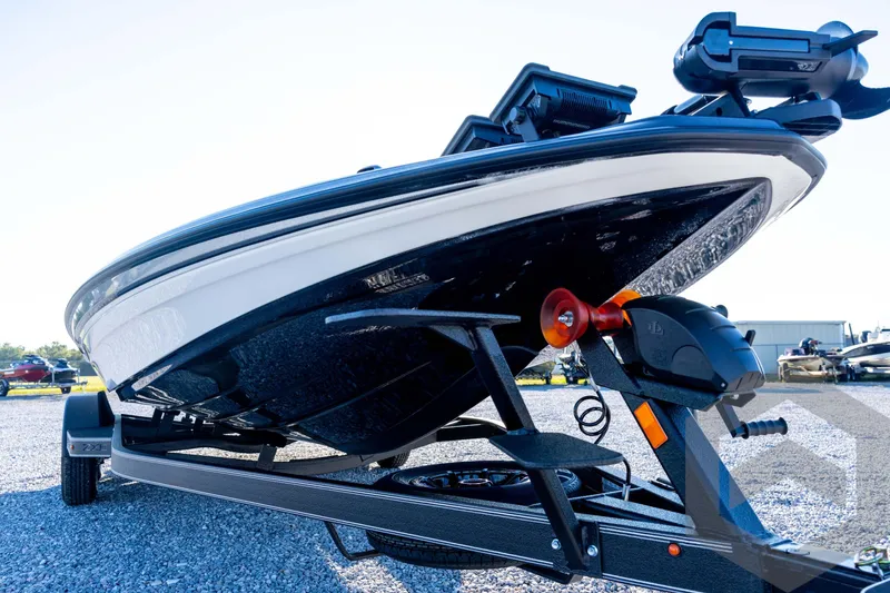 Slide: The Image of 2026 Skeeter ZXE21 boat on trailer, close-up view of hull and equipment. - 9