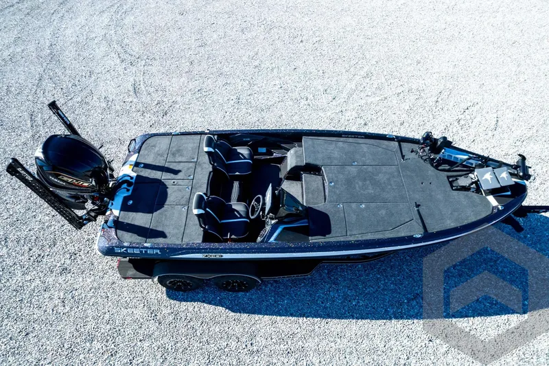 Slide: The Image of 2026 Skeeter ZXE21 fishing boat, aerial view, sleek design, dual seats, powerful outboard motor. - 91