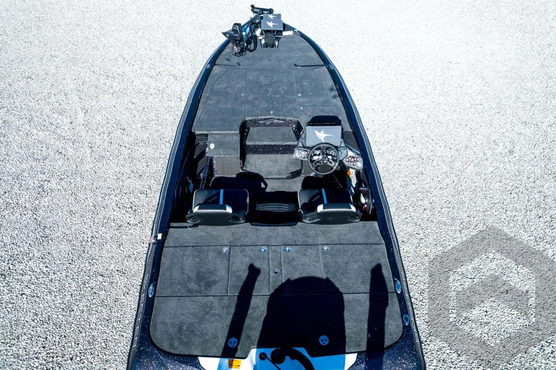 Slide: The Image of 2026 Skeeter ZXE21 boat interior with dual seats and steering console. - 93