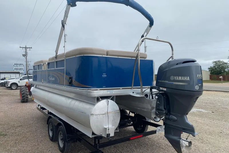 Slide: The Image of 2013 Sweetwater 2286 pontoon boat with Yamaha 115 outboard motor on trailer. - 5
