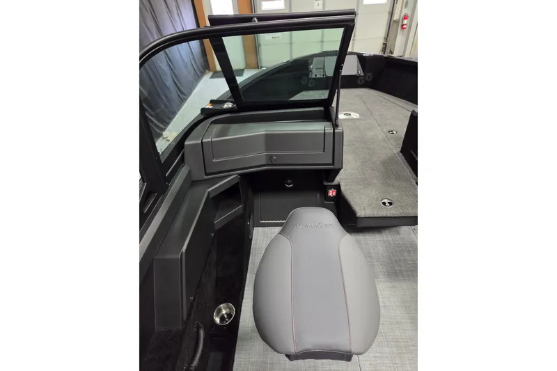 Slide: The Image of 2026 Alumacraft Competitor 185X Sport interior with gray seating and modern dashboard design. - 9