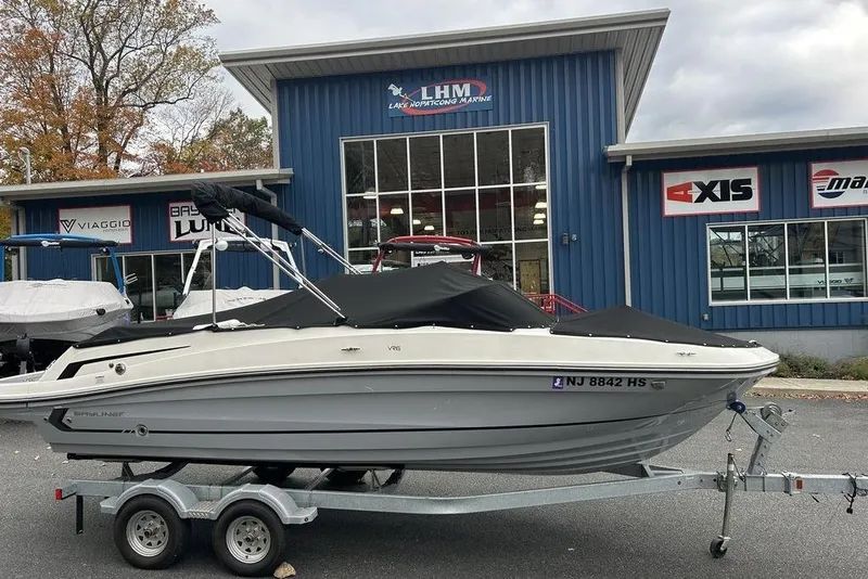 Slide: The Image of 2022 Bayliner VR6 Bowrider OB on trailer outside marine dealership. - 3
