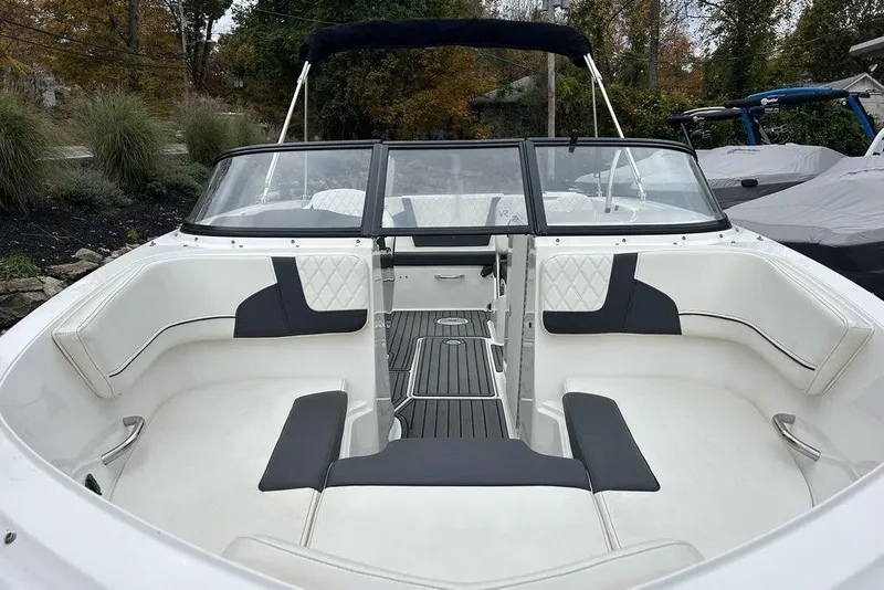 Slide: The Image of 2022 Bayliner VR6 Bowrider OB with spacious seating and sleek design. - 6