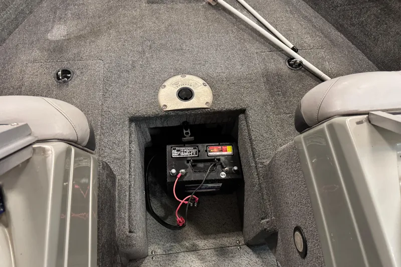 Slide: The Image of 2016 Tracker Pro Guide V-175 Combo boat interior with battery compartment. - 18