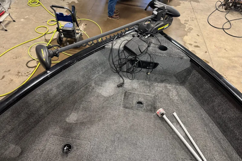 Slide: The Image of 2016 Tracker Pro Guide V-175 Combo boat interior with trolling motor and equipment. - 19