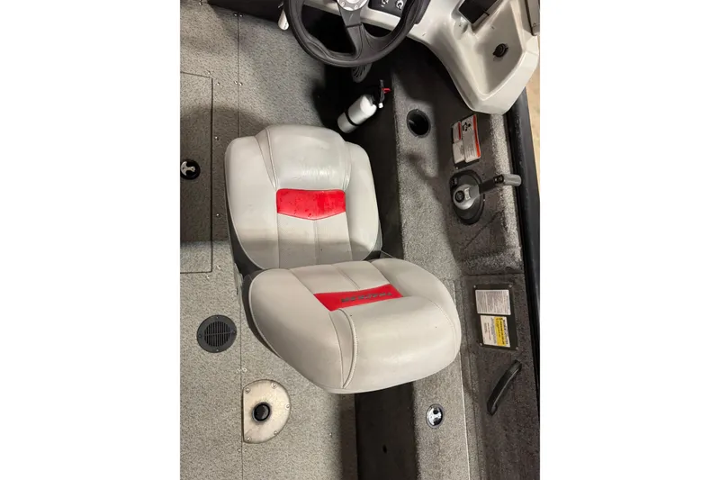 Slide: The Image of 2016 Tracker Pro Guide V-175 Combo boat interior with gray and red seating. - 9
