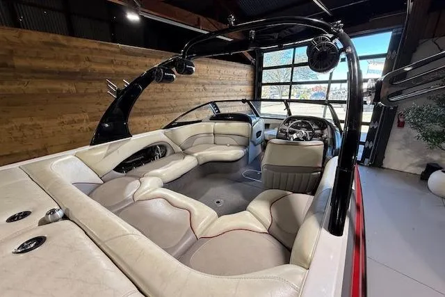 Slide: The Image of 2007 Malibu Wakesetter 20 VTX interior with leather seating and modern dashboard. - 16