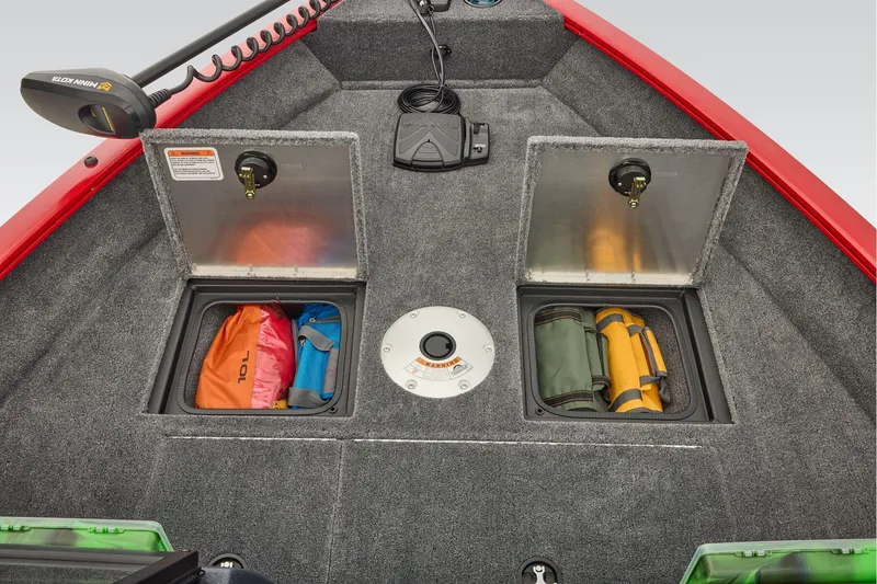 Slide: The Image of Manufacturer Provided Image: 2026 Tracker Pro Guide V-16 WT boat interior with storage compartments and gear. - 38