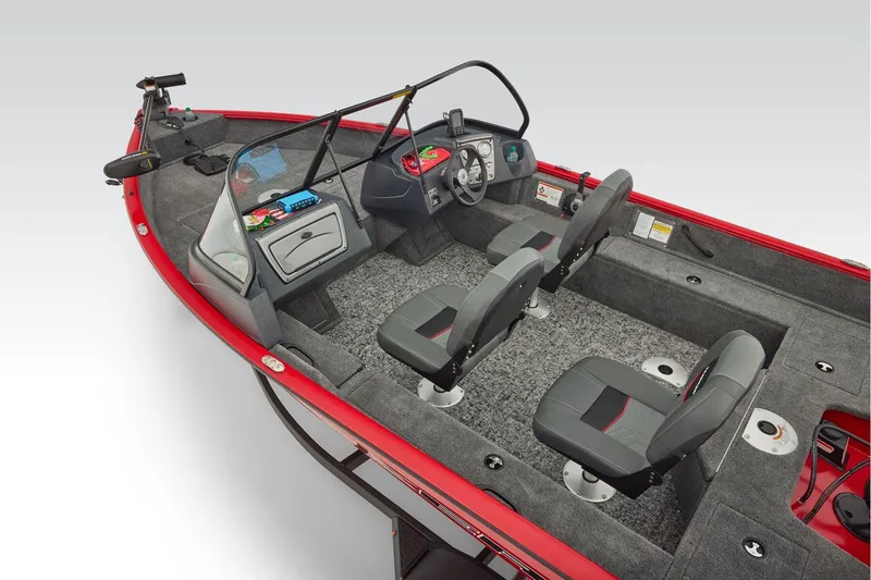 Slide: The Image of Manufacturer Provided Image: 2026 Tracker Pro Guide V-16 WT boat interior with seating and steering console. - 45
