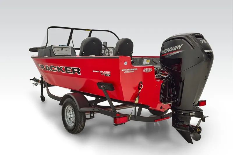 Slide: The Image of Manufacturer Provided Image: 2026 Tracker Pro Guide V-16 WT boat with Mercury engine, red exterior, on trailer. - 64