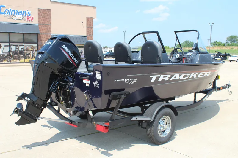 Slide: The Image of 2026 Tracker Pro Guide V-16 WT boat with Mercury engine on trailer. - 7