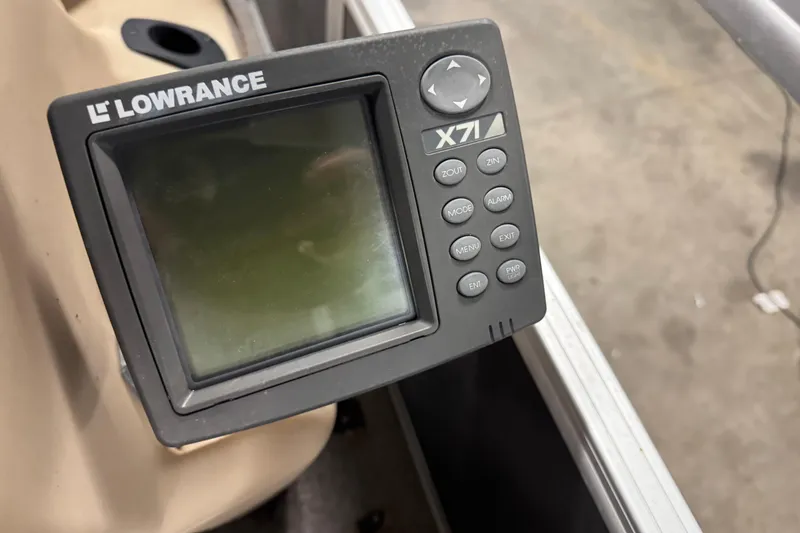 Slide: The Image of Lowrance X71 fish finder on 2018 Sun Tracker Bass Buggy 18 DLX boat. - 12