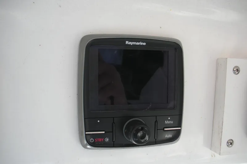 Slide: The Image of Raymarine control panel on 2006 Baha Cruisers 277 GLE boat. - 12