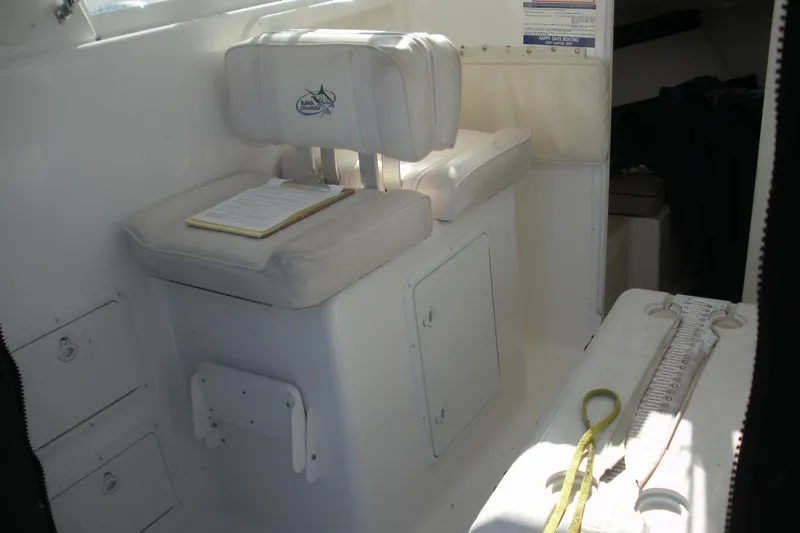 Slide: The Image of 2006 Baha Cruisers 277 GLE interior with cushioned seating and storage compartments. - 20