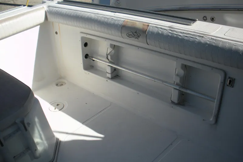 Slide: The Image of Interior view of a 2006 Baha Cruisers 277 GLE boat, featuring seating and storage. - 22