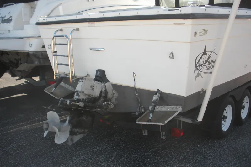 Slide: The Image of 2006 Baha Cruisers 277 GLE boat on trailer, rear view with propeller and ladder. - 28