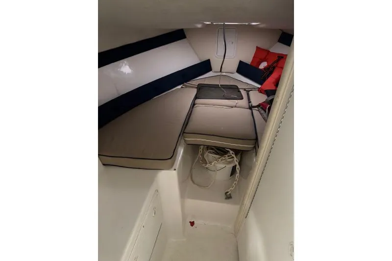 Slide: The Image of 2006 Baha Cruisers 277 GLE cabin interior with cushions and life jackets. - 5
