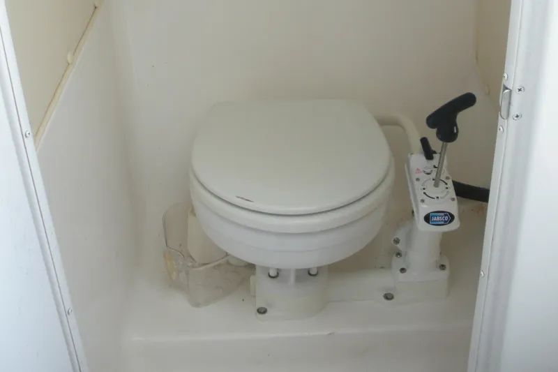 Slide: The Image of Marine toilet in 2006 Baha Cruisers 277 GLE boat, featuring Jabsco manual pump. - 9