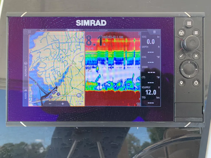 Slide: The Image of Simrad navigation and sonar display on 2000 Viking 50 Convertible boat. - 44