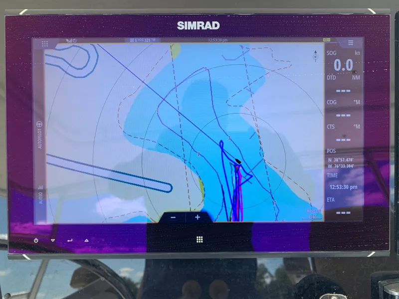 Slide: The Image of Simrad navigation display on a 2000 Viking 50 Convertible boat, showing nautical chart. - 47