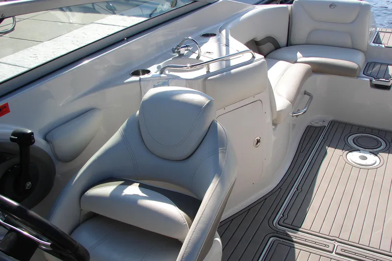 Slide: The Image of 2008 Crownline 270 BR boat interior with plush seating and modern design. - 13