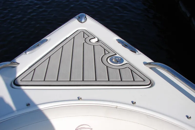 Slide: The Image of Bow of 2008 Crownline 270 BR boat with sleek deck design. - 24