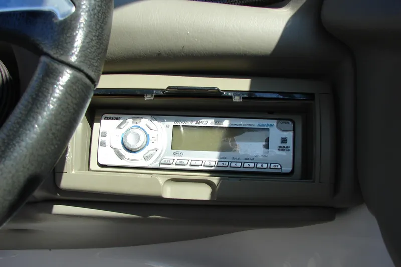 Slide: The Image of 2008 Crownline 270 BR boat dashboard with Sony marine stereo system. - 32
